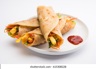 Veg Spring Roll OR Wrap also known as Franky, made using Paneer and Vegetables stuffed inside Chapati or Roti. Served with Tomato Ketchup. Selective focus