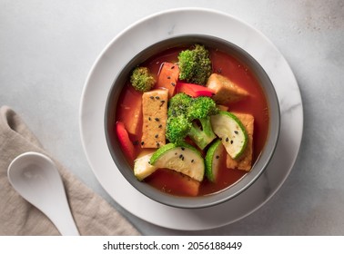 Vegan Asian Soup With Tofu Cheese And Vegetables. Plant Based Diet Concept. Flat Lay