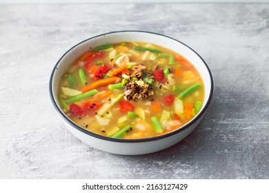 vegan asian vegetable soup with mixed vegtable and soy protein, healthy plant-based food recipes
