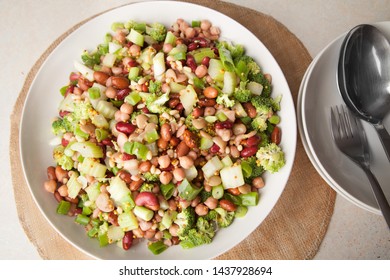 Vegan Bean And Green Salad, Broccoli, Celery, Chickpea, Kidney Bean, Mixed Beans, Spring Onion, Mustard Seeds And Apple Cider Vinegar Dressing.