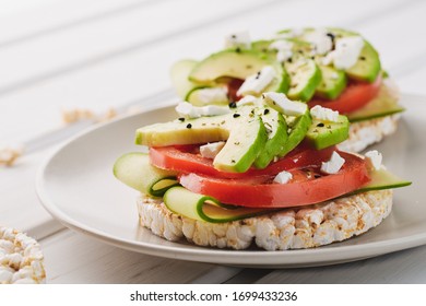 Vegan Breakfast Rice Cake Avocado Tomato Spices.