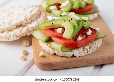 Vegan Breakfast Rice Cake With Avocado And Tomato.