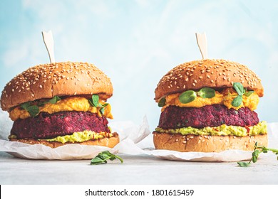 Vegan Burger With Beetroot Cutlet, Sweet Potato Sauce And Guacamole.