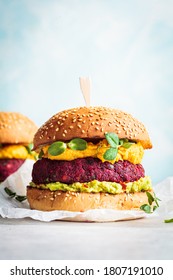 Vegan Burger With Beetroot Cutlet, Sweet Potato Sauce And Guacamole.