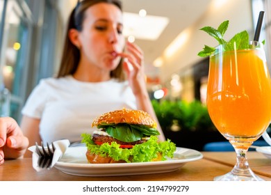 Vegan Burger Healthy Vegetarian Hamburger. Salad, Avocado, Vegetable On Veggie Sandwich Eating Cute Woman. Vegetarian Hamburger Healthy Diet Food