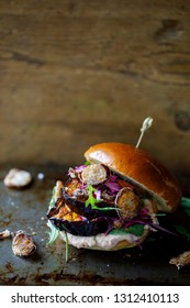Vegan Burger With White Bean Puree And Spicy Aubergine Slices