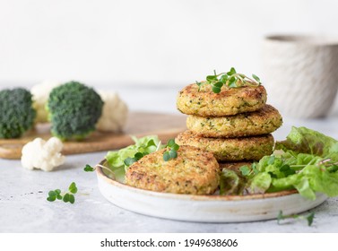 Vegan burgers with quinoa, broccoli, cauliflower served with salad. Healthy vegan food concept. copy space - Powered by Shutterstock