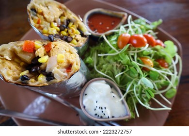 Vegan Burrito With Salat On A Plate