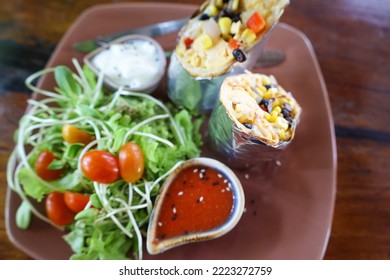 Vegan Burrito With Salat On A Plate