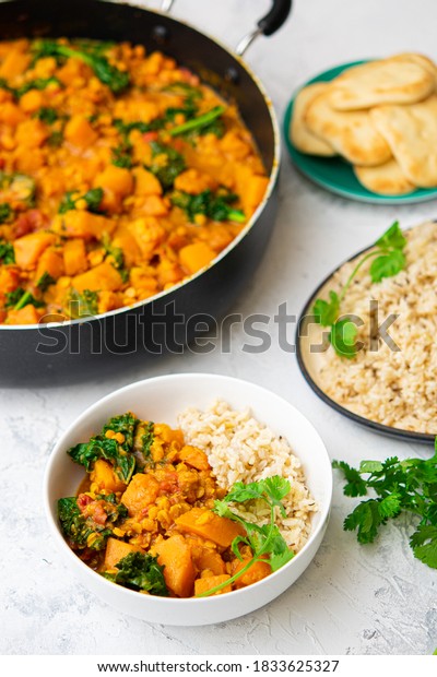 Vegan\
Butternut Squash Curry with Rice and Pita\
Bread