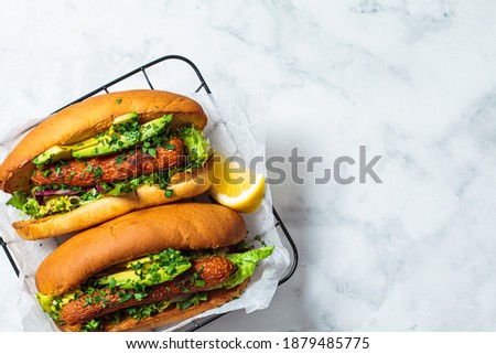 Similar – Image, Stock Photo Carrot Dog vegetarian hot dog
