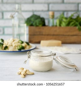 Vegan Cashew Cream Sauce For Pasta. Light Wooden Background
