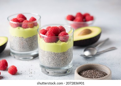 Vegan Chia Pudding With Raspberries And Avocado Mousse Layer. Healthy Guilt Free Dessert