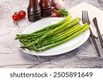 Vegan cuisine - Boiled asparagus with olive oil