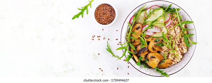 Vegan Food. Breakfast Oatmeal Porridge With Green Herbs Of Mushrooms, Cucumber, Radish And Flax Seeds. Healthy Balanced Food. Top View, Overhead,  Banner