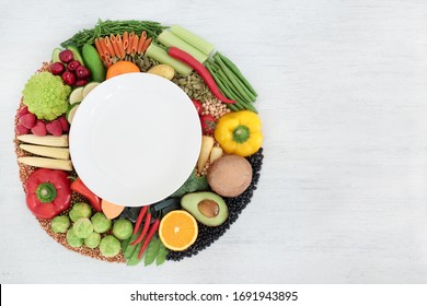 Vegan Food For Clean Eating Concept With Foods High In Protein, Vitamins, Minerals, Anthocyanins, Antioxidants, Omega 3, Smart Carbs And Dietary Fibre. Flat Lay On Rustic Wood Background. Copy Space.