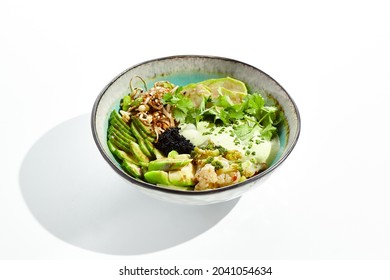 Vegan Food - Poke Bowl With Vegetables, Edamame Beans, Soybean Sprouts. Poke Bowl With Avocado And Vegetables Isolated On White Background. Eat Less Meat. Plant - Based Eating