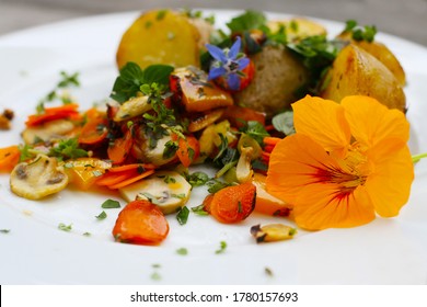 Vegan Food - Vegetable Pan With Edible Flowers, Capuchin Cress, Borage, Garden Herbs