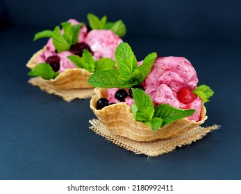 Vegan Fruity Ice Cream With Red Berries And Banana. Sorbet In Waffle Bowls With Mint And Fresh Berries. On A Black Background. Selective Focus.