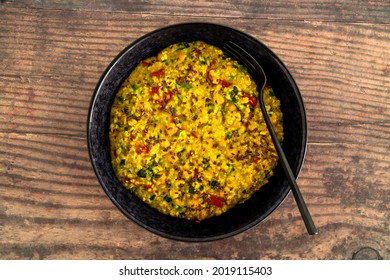 vegan golden savoury oats with bell pepper chickpeas and spinach topped with fla seeds, healthy plant-based food recipes - Shutterstock ID 2019115403