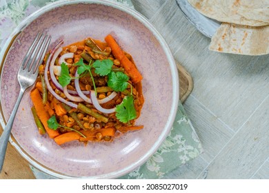 Vegan Green Lentil Curry With Paratha Flatbread - Overhead View