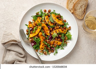 Vegan grilled pumpkin and roasted chickpeas salad, top view