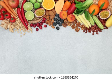 Vegan Health Food Background Border With A Foods To Boost The Immune System. High In Protein, Vitamins, Minerals, Antioxidants, Anthocyanins, Fibre, Omega 3 And Smart Carbs. Ethical Food Concept. 
