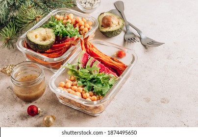 Vegan Healthy Meal Prep Containers. Chickpeas, Sweet Potatoes, Arugula, Radish, Avocado And Sauce For Lunch On Concrete Background. Vegan, Healthy, Detox Food Concept. Top View