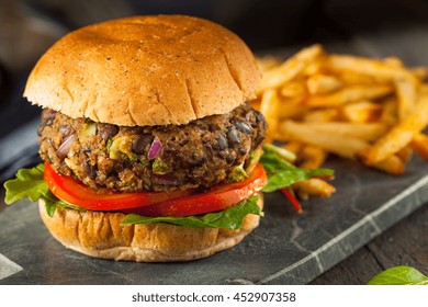 Vegan Homemade Portabello Mushroom Black Bean Burger with Fries - Powered by Shutterstock