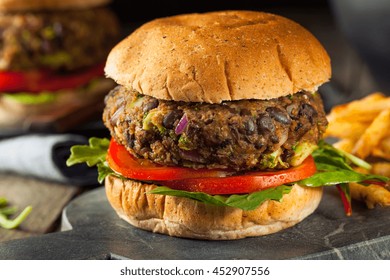 Vegan Homemade Portabello Mushroom Black Bean Burger with Fries - Powered by Shutterstock