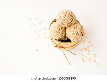 Vegan Ice Cream Made From Oat Milk And Oat Flakes On A Light Background With Copy Space. Top View