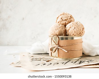 Vegan Ice Cream Made From Oat Milk In A Tin Can On A Light Background With Space For Text.