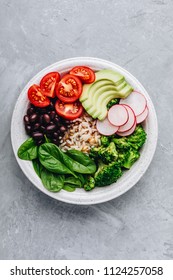 Vegan Lunch. Burrito Buddha Bowl With Wild Rice And Broccoli, Spinach, Black Beans, Tomatoes, Avocado And Radish