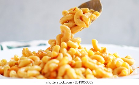 Vegan Mac And Cheese Made With A Cashew Cream Sauce - Close Up, White Background