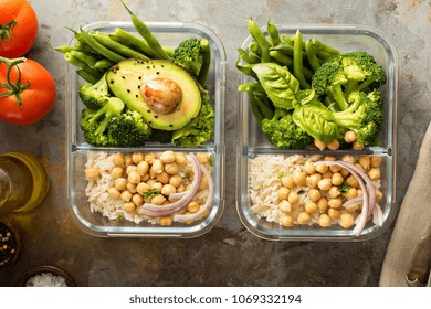 Vegan Meal Prep Containers With Cooked Rice, Chickpeas And Vegetables