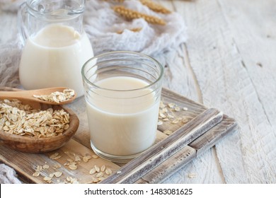 Vegan oat milk, non dairy alternative milk in a glass close up - Shutterstock ID 1483081625