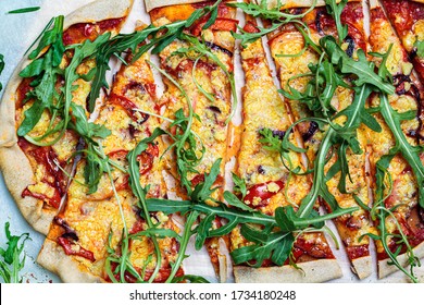 Vegan Pizza With Tomato Sauce, Pepper, Vegan Cheese And Arugula. Healthy Vegan Food Concept.