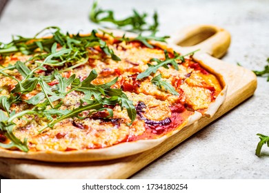 Vegan Pizza With Tomato Sauce, Pepper, Vegan Cheese And Arugula. Healthy Vegan Food Concept.