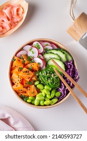 Vegan Poke bowl with Plant based salmon, wakame and edamame - Shutterstock ID 2140593727