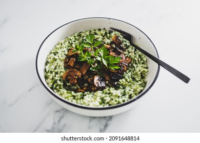 vegan risotto with fresh mushrroms and spinach, healthy plant-based food recipes
