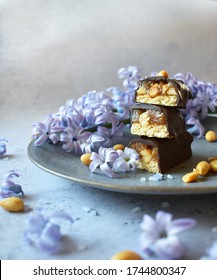 Vegan Snickers Bars With Violet Flowers