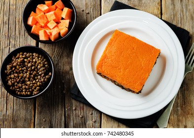 Vegan Sweet Potato Shepherd's Pie On A Wood Background. Toning. Selective Focus