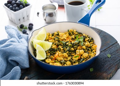 Vegan Tofu Scramble With Spinach And Carrots For Breakfast With Coffee On White Table