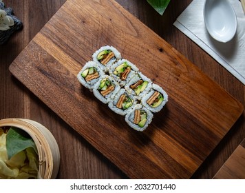 Vegan Ura Maki On Wooden Plate