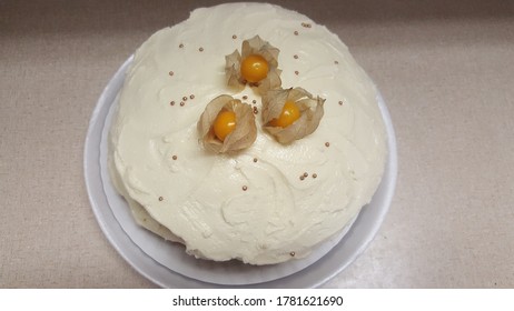 Vegan Vanilla Cake With Cream Frosting And Gooseberries On Top