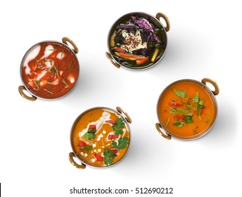 Vegan Or Vegetarian Restaurant Dishes, Hot Spicy And Creamy Indian Soups And Salads In Copper Bowls. Traditional Indian Cuisine Meal Assortment Isolated On White Background. Healthy Eastern Local Food