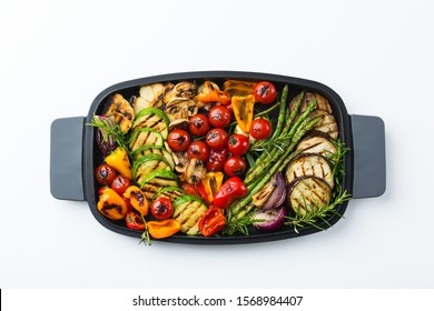 Vegan, Vegetarian, Seasonal, Summer Eating Concept. Grilled Vegetables In A Pan On A White Table, Isolated. Top View Flat Lay Background