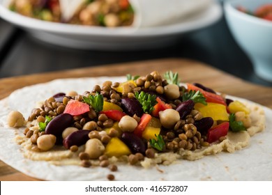 Vegan Wraps With Lentil, Chickpea, Kidney Bean, Peppers And Hummus Sauce