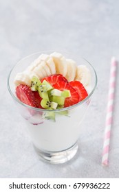 Vegan yogurt with fresh fruits and berries in cup. Healthy diet snack