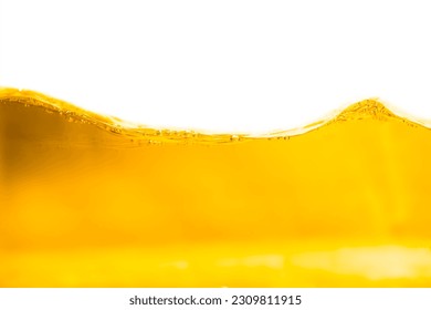 Vegatable golden oil surface, bubbles,ripple and wave isolated on white background.